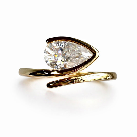 Liora : Pear Cut Lab Grown Diamond Engagement Ring - Half Bezel Bypass