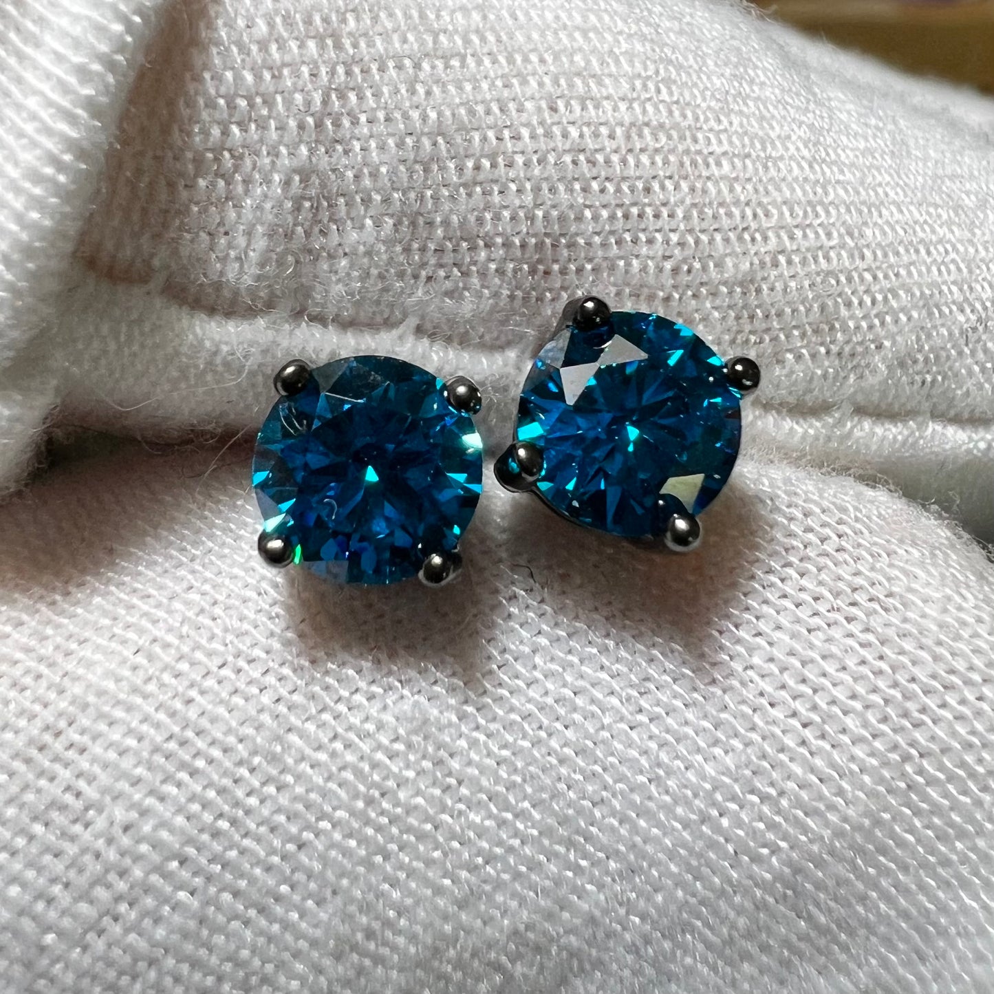 Swiss Blue Topaz Eclipse : Black Gold Blue Topaz Stud Earrings